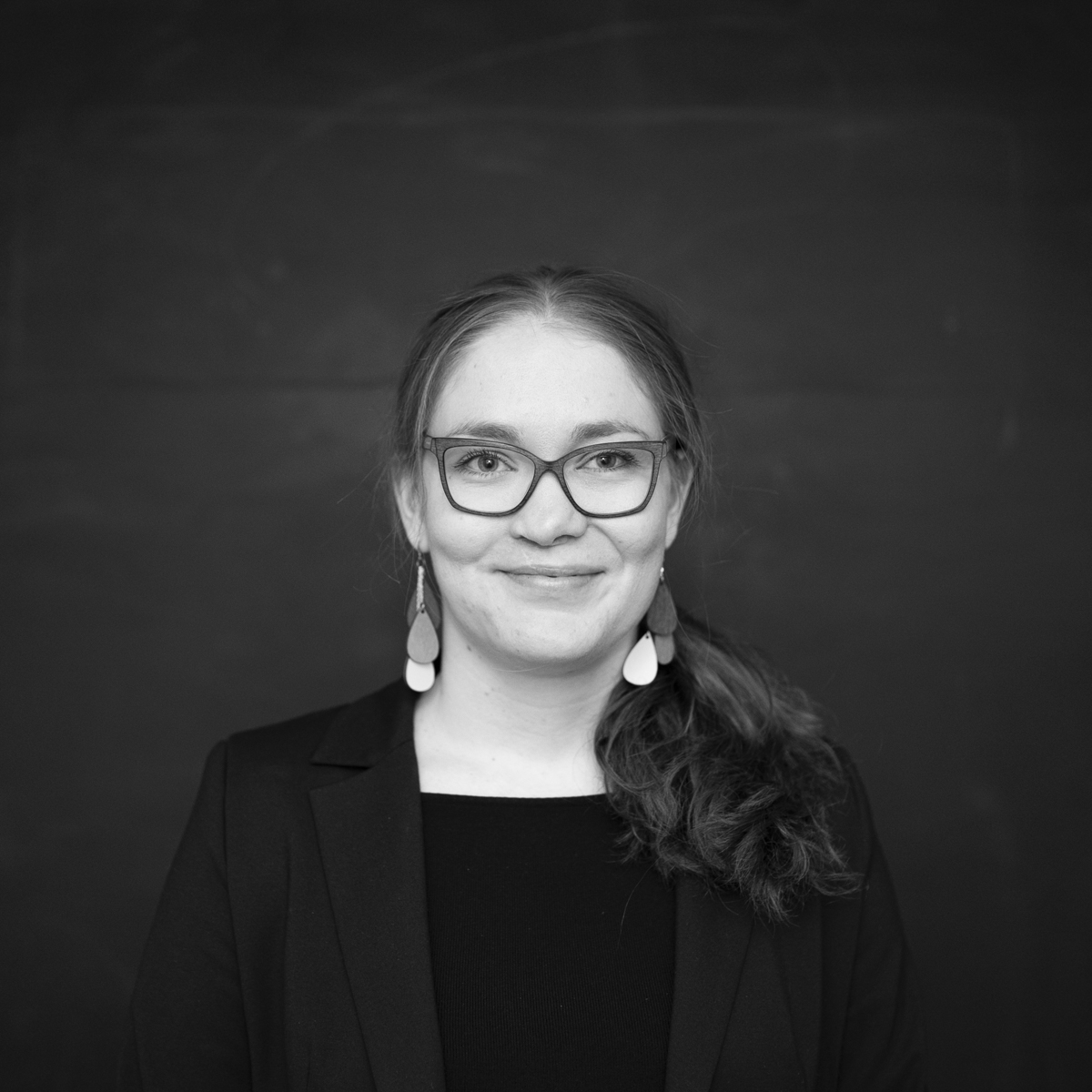 Hymyilevä hallituksen jäsen Palosuo