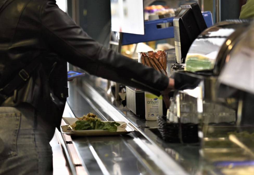 Student paying for her lunch